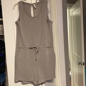 Soft gray romper with adjustable tie and pocket